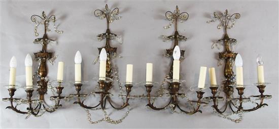 A set of four ormolu three branch wall lights c.1900, width 1ft 3in. height 2ft 1in.